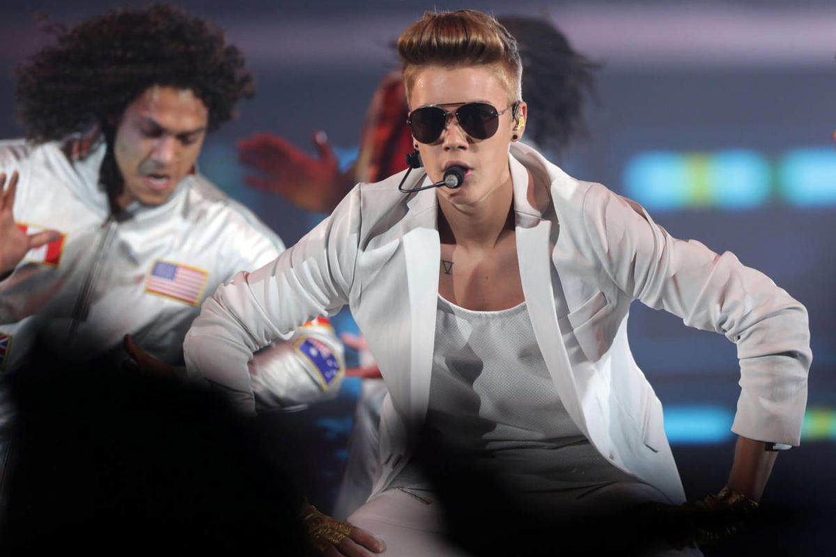 Canadian singer Justin Bieber performs on stage during the "I Believe Tour " in Munich, southern Germany, on Thursday, March 28, 2013.