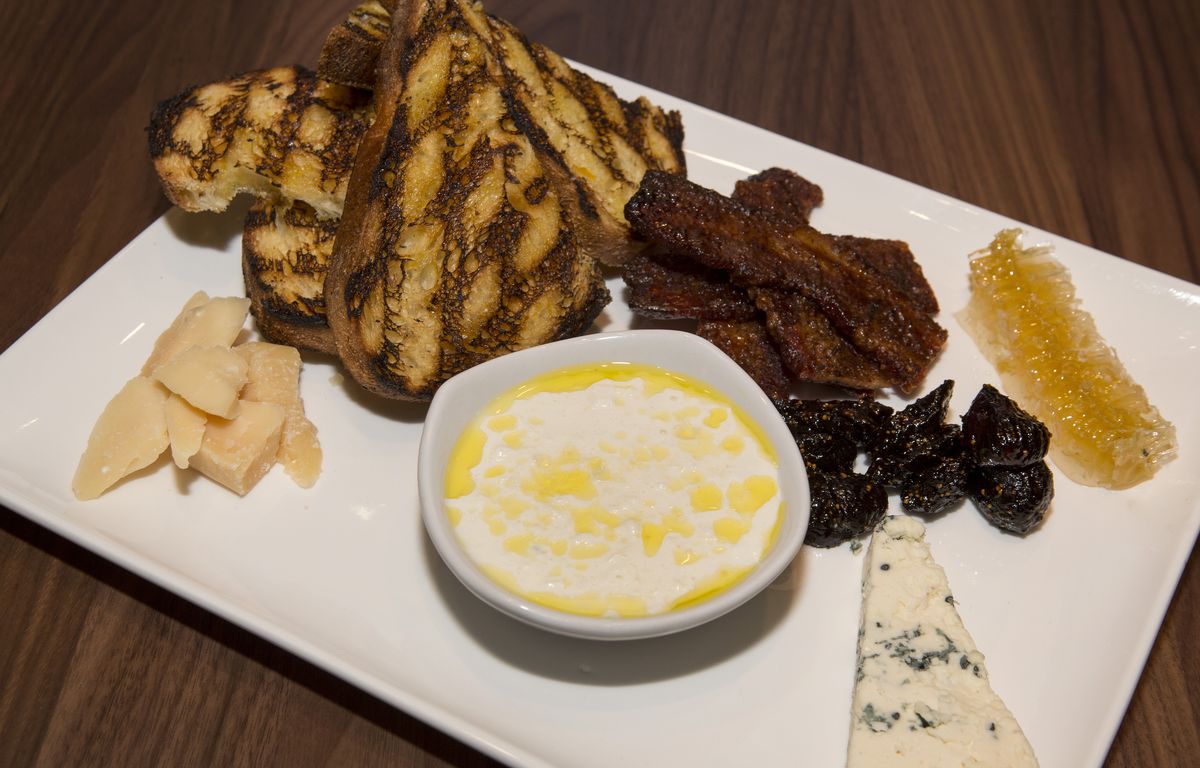 A cheese and accompaniments plate