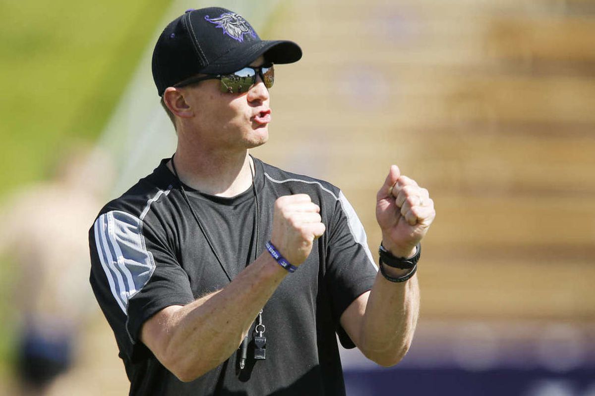 New Weber State head coach Jay Hill instructs during practice in Ogden  Thursday, April 10, 2014. 