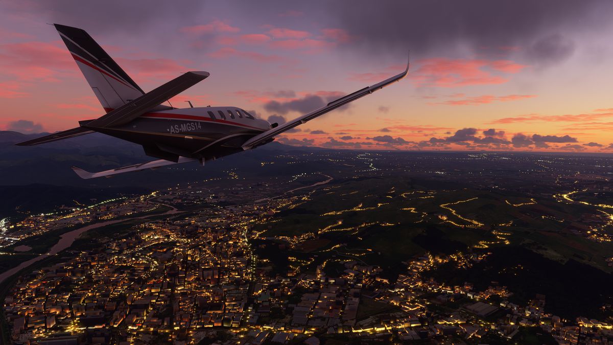 A turboprop plane floating over a night scene, with realistic light temperatures over roads and bridges below, in Microsoft Flight Simulator