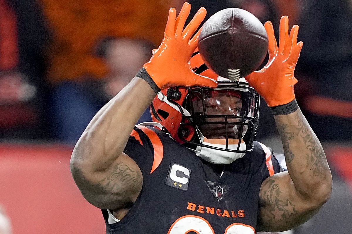 Joe Mixon #28 of the Cincinnati Bengals makes a catch against the Baltimore Ravens during the first quarter in the AFC Wild Card playoff game at Paycor Stadium on January 15, 2023 in Cincinnati, Ohio.