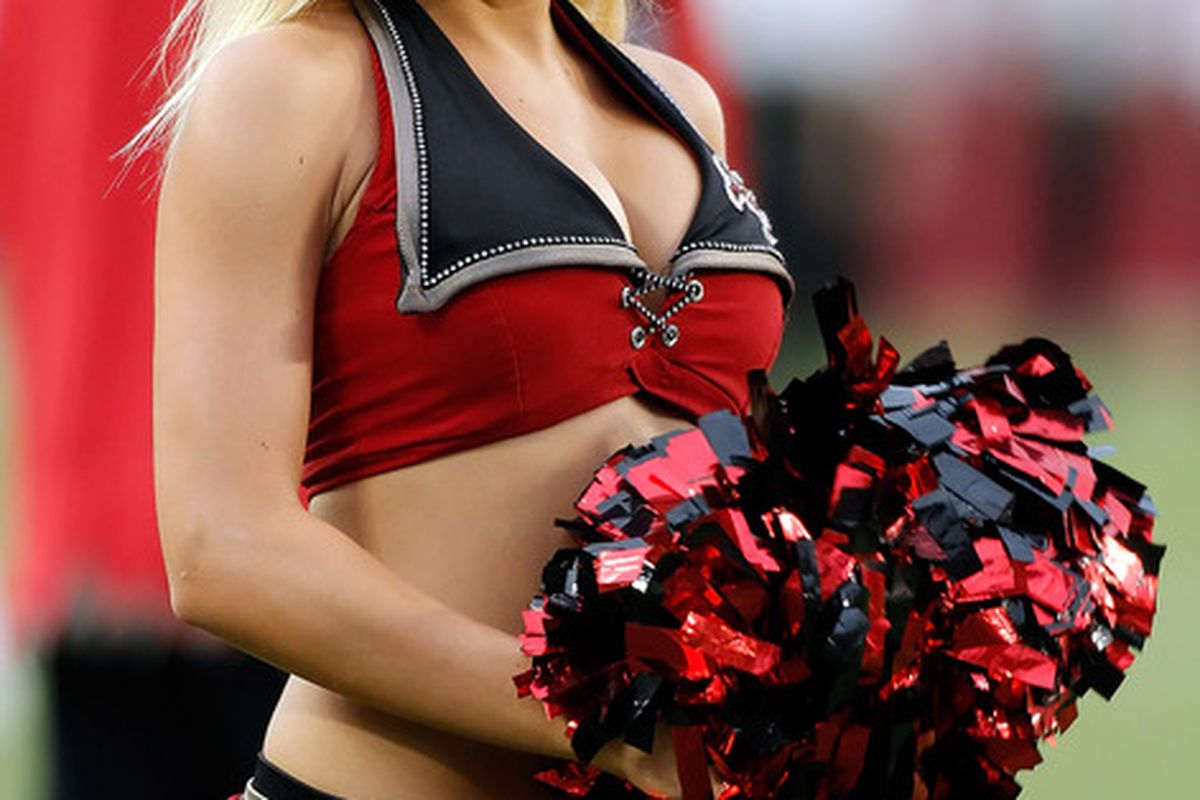 TAMPA FL - AUGUST 21:  A cheerleader of the Tampa Bay Buccaneers performs just before the start of the game against the Kansas City Chiefs at Raymond James Stadium on August 21 2010 in Tampa Florida.  (Photo by J. Meric/Getty Images)