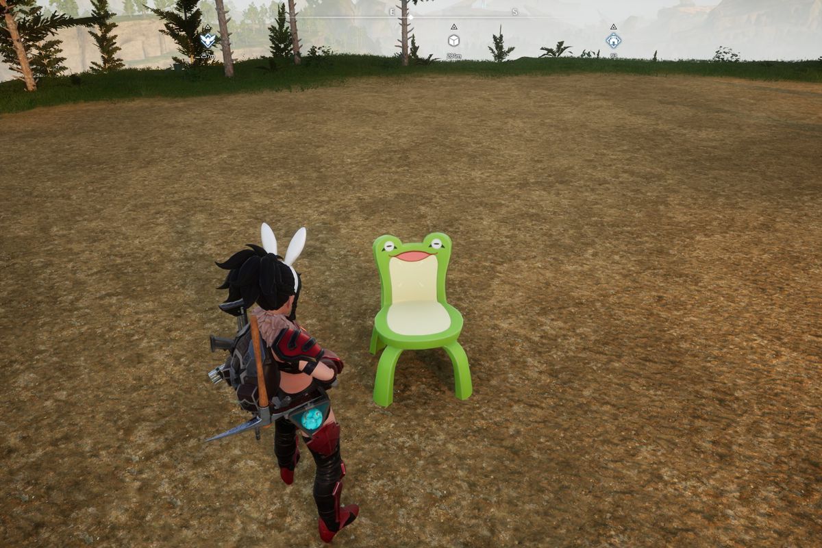 A screenshot from Palworld. A character is standing over a froggy chair that looks like the one from animal crossing. It’s a green chair that has a frog face on it. 