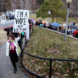 April Briney, of Payson, attends a liberty march to the Capitol in Salt Lake City on Friday, Feb. 10, 2017.