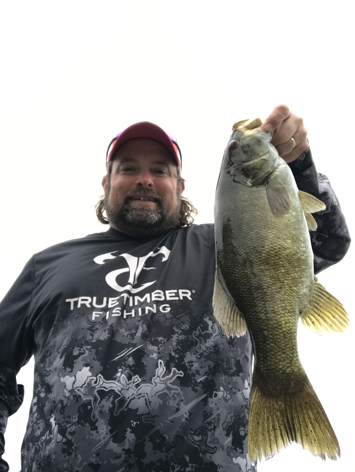 Ken “Husker” O’Malley with a bass from northern Wisconsin. Provided photo