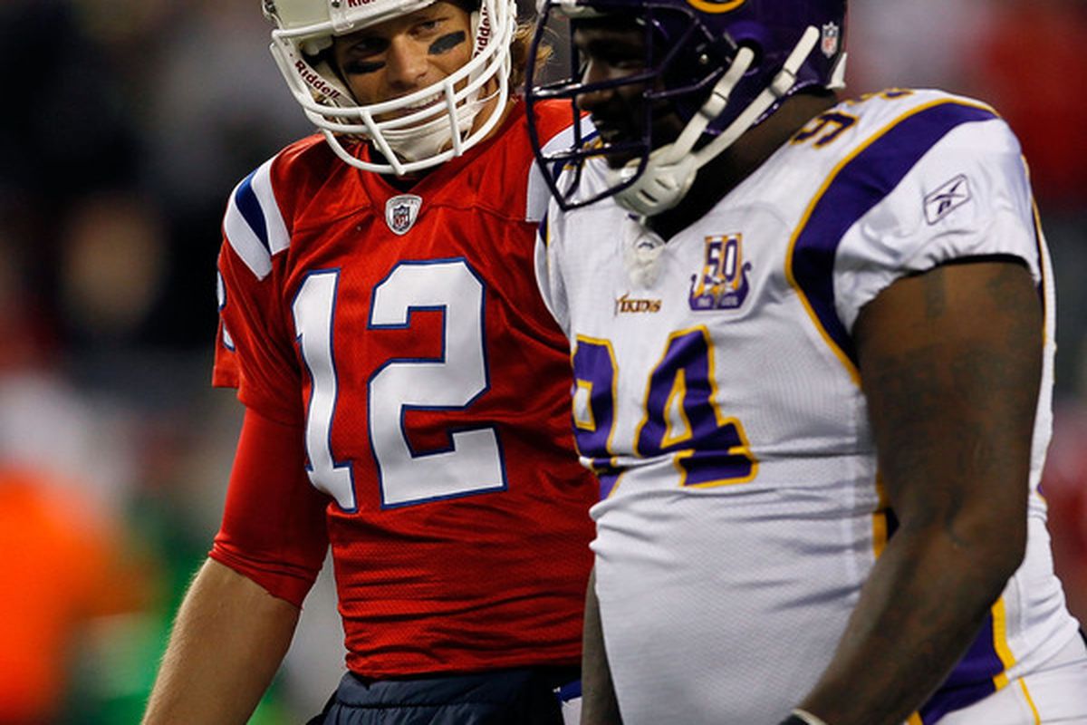 FOXBORO MA - OCTOBER 31:  Tom Brady #12 of New England Patriots has words with Pat Williams #94 of the Minnesota Vikings at Gillette Stadium on October 31 2010 in Foxboro Massachusetts. (Photo by Jim Rogash/Getty Images)