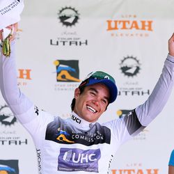 Travis McCabe of team United Health Care Professional Cycling has fun on stage after winning the Utah Sports Commission Sprint Leader jersey in Stage 6 of the Tour of Utah cycling race at Snowbird on Saturday, Aug. 5, 2017.