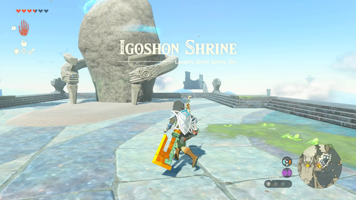 Link approaches a bulbous stone building, with a stone serpent surrounding it counterclockwise. It is the entrance to the Igoshon shrine.