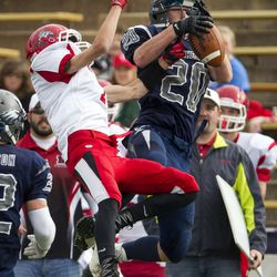 Duchesne linebacker Ammon Graehl intercepts a pass intended for and Milford wide receiver Stetson Wright during a UHSAA 1A state semifinal football game at Weber State University in Ogden on Friday, Nov. 4, 2016. Duchesne defeated Milford 47-0 and advances to the Class A state championship game.