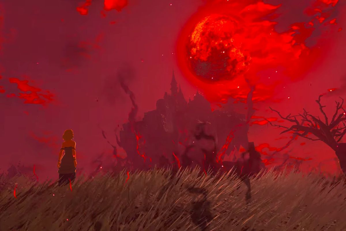 Zelda stares at a Blood Moon over Hyrule Castle in Zelda Tears of the Kingdom.