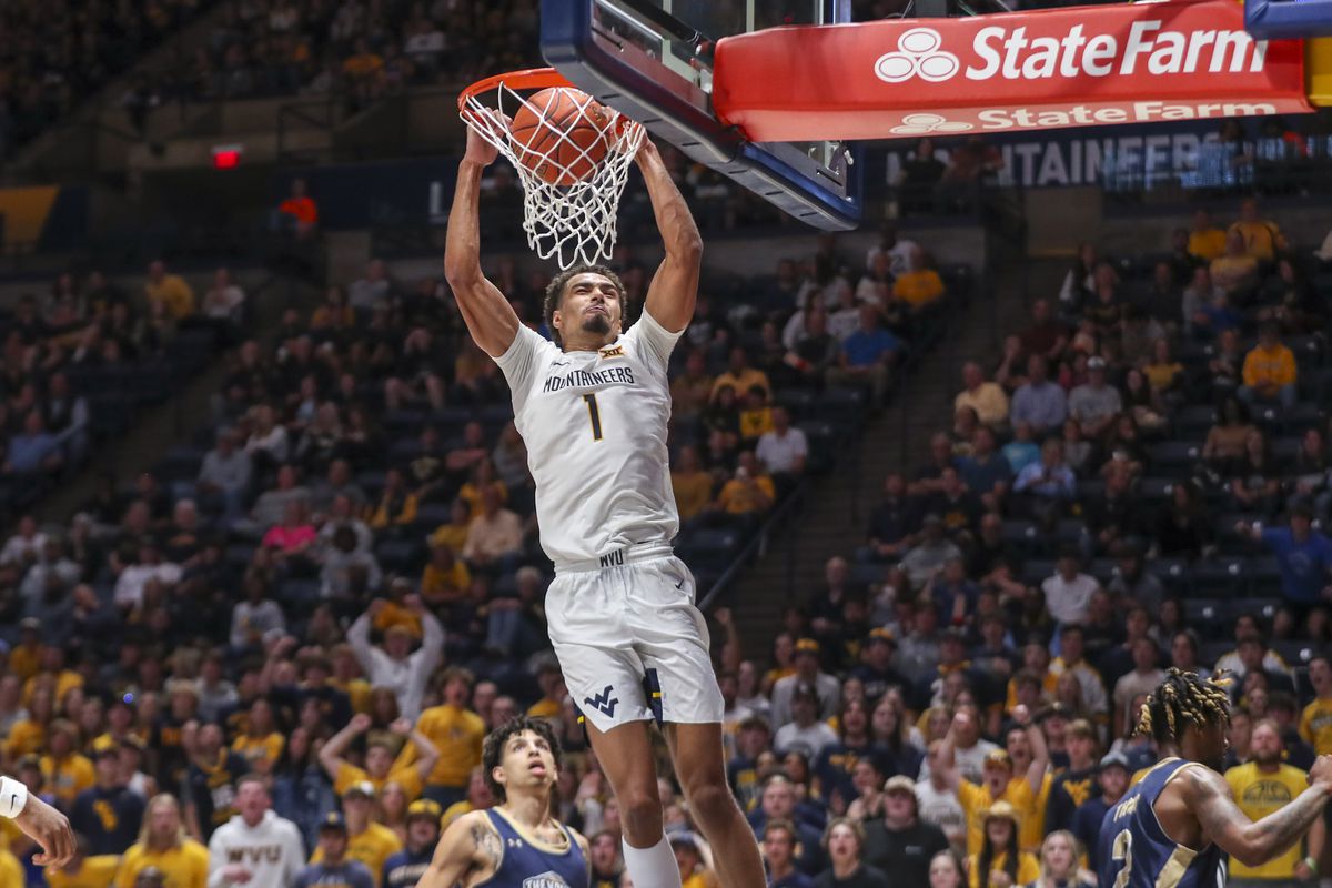 West Virginia Mountaineers forward Emmitt Matthews Jr. dunks the ball during the second half against the Mount St. Mary’s Mountaineers at WVU Coliseum.&nbsp;