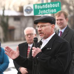 Millcreek Mayor-elect Jeff Silvestrini, Salt Lake County Mayor Ben McAdams and other officials announce the official opening of the new roundabout on 2300 East in Millcreek on Tuesday, Dec. 20, 2016.