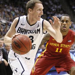 BYU's Skyler Halford drives past Monte Morris as BYU and Iowa State play Wednesday, Nov. 20, 2013 in the Marriott Center in Provo.