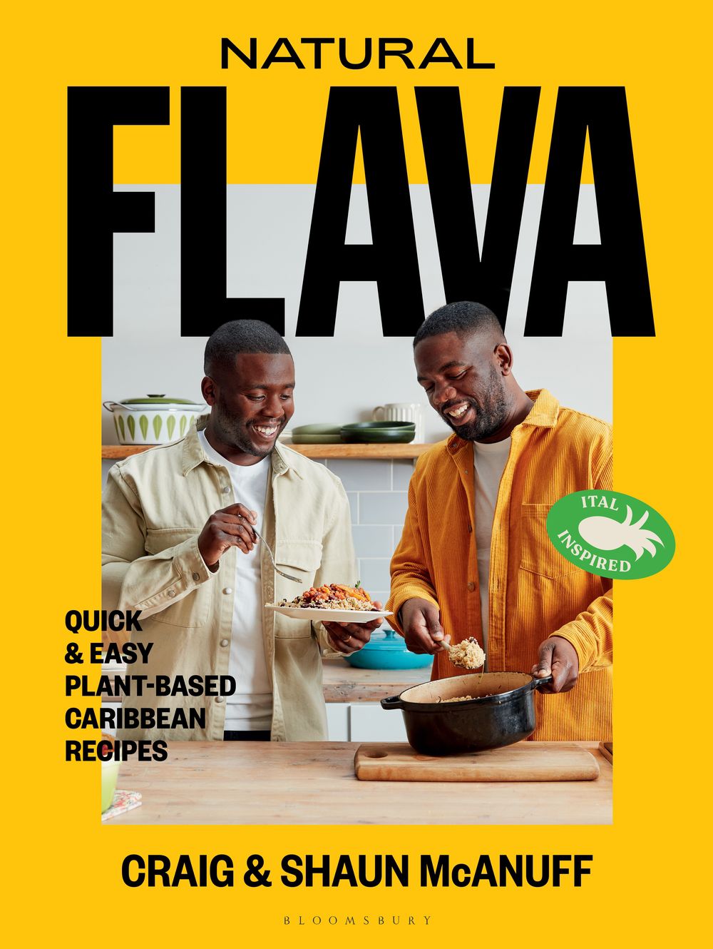 The cover of the Natural Flava cookbook shows the McAnuff brothers in the kitchen, tasting food.