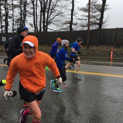 Mikie Pylilo approaches her family at mile 16 of the Boston Marathon last week.