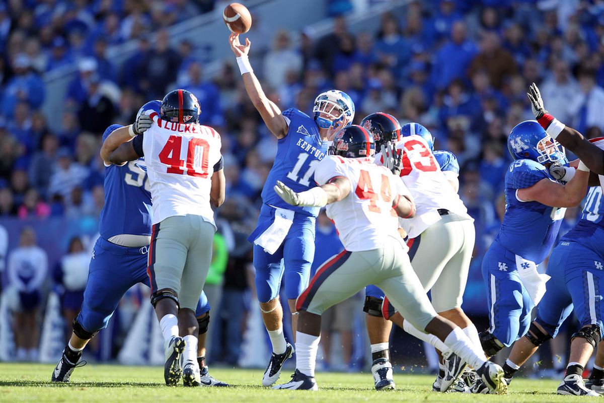 LEXINGTON, KY - NOVEMBER 05:  Maxwell Smith #11 of the Kentucky Wildcats throws a pass during the game against the  Mississippi Rebels at Commonwealth Stadium on November 5, 2011 in Lexington, Kentucky.  (Photo by Andy Lyons/Getty Images)