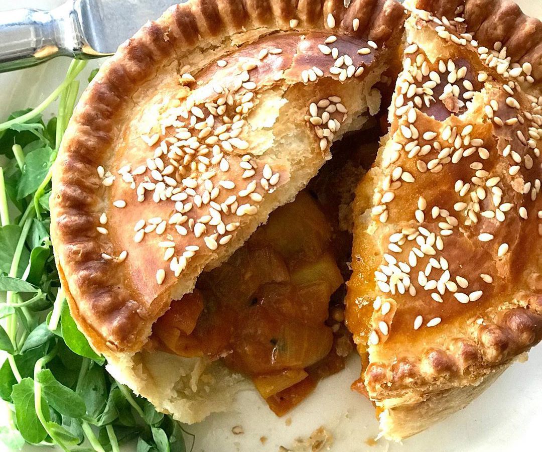 A savory pie topped with sesame seeds, from Pleasant House Pub in Chicago.