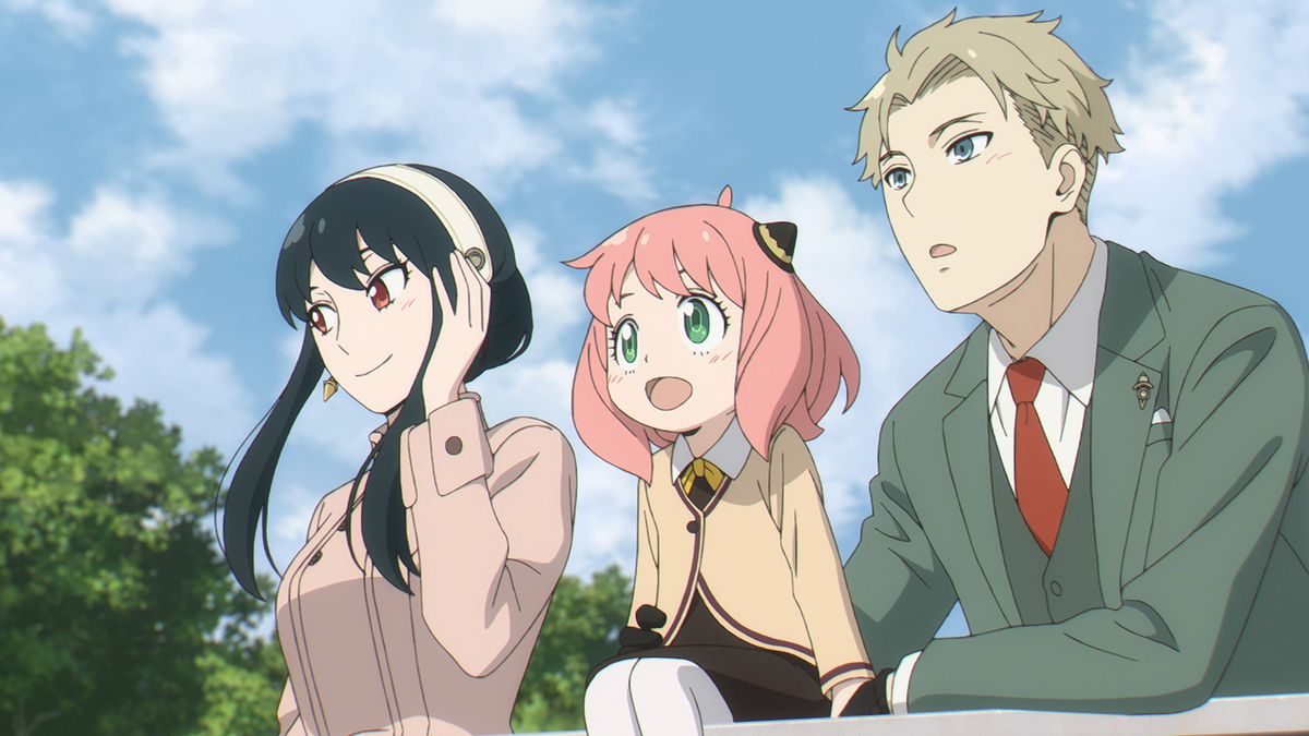 Yor, Anya, and Loid Forger from Spy x Family sitting together on a sunny day (2022).