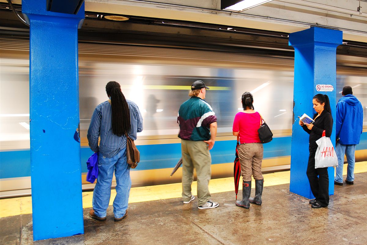 Commuters waiting for the Blue Line in Boston.