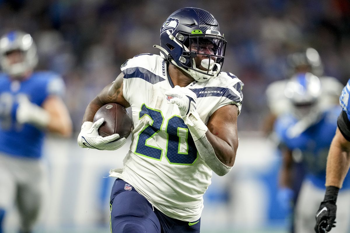 Rashaad Penny #20 of the Seattle Seahawks runs the ball against the Detroit Lions at Ford Field on October 2, 2022 in Detroit, Michigan.