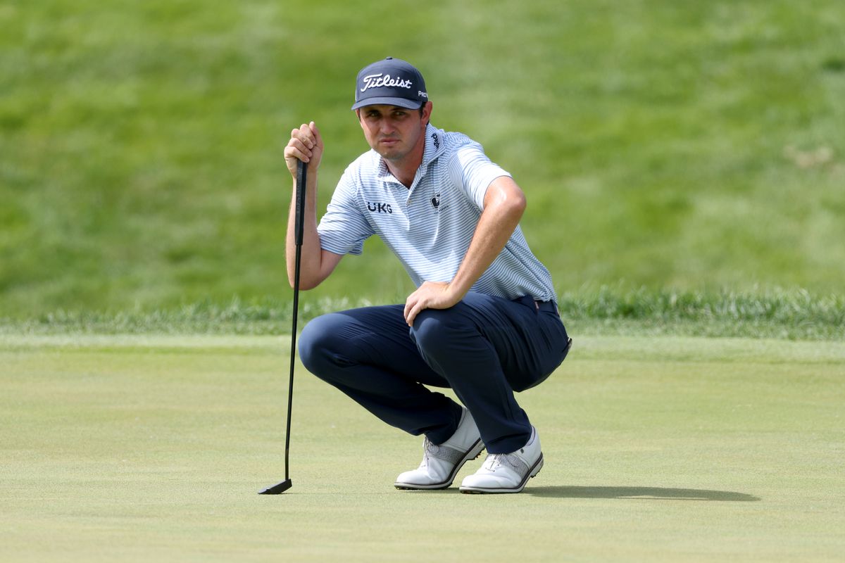 J.T. Poston of the United States lines up a putt on the 14th green during the third round of the John Deere Classic at TPC Deere Run on July 02, 2022 in Silvis, Illinois.