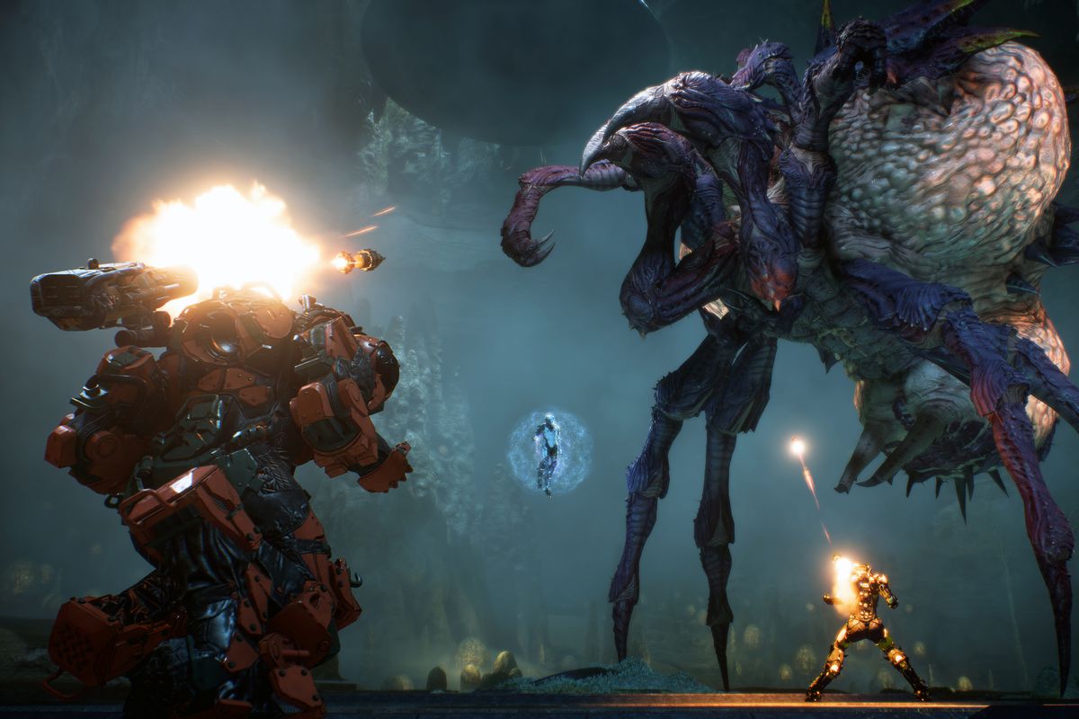 Anthem - four players fighting a giant arachnoid boss
