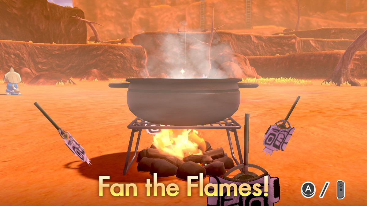 Players fan the fire under a curry pot in Pokémon Sword and Shield