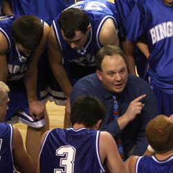 Bingham High basketball coach Mark Dubach talks with his team March 3, 2006. Dubach resigned earlier this year amid allegations of financial impropriety.