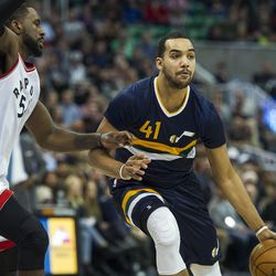 Utah forward Trey Lyles (41) dribbles the ball against Toronto forward Patrick Patterson (54) during an NBA basketball game in Salt Lake City on Friday, Dec. 23, 2016. Toronto took down Utah with a final score of 104-98.