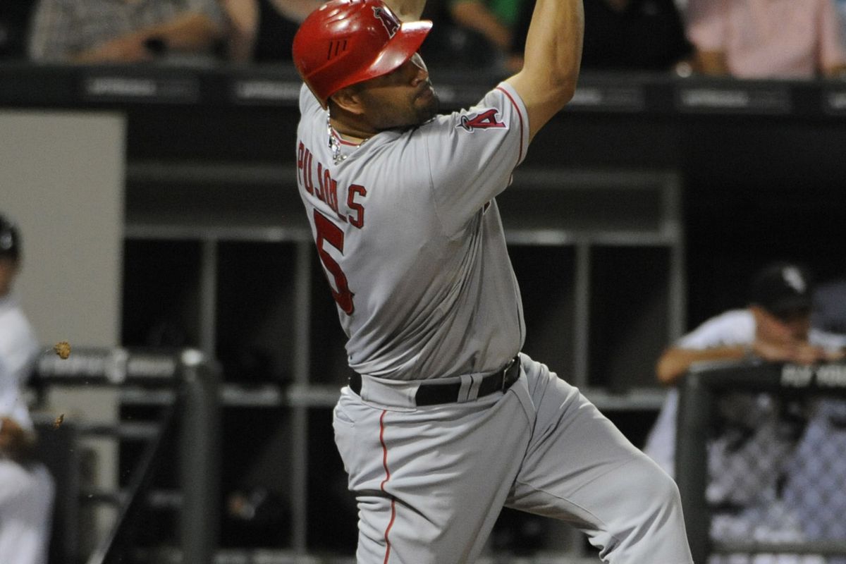 CHICAGO, IL - AUGUST 03: Albert Pujols #5 of the Los Angeles Angels of Anaheim hits a home run in the sixth inning against the Chicago White Sox on August 3, 2012 at U.S. Cellular Field in Chicago, Illinois.  (Photo by David Banks/Getty Images)