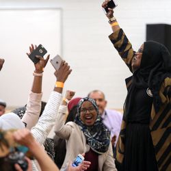 A woman stands up and says, "I'm a black, Muslim female for Bernie Sanders!" before Sanders' foreign policy speech at West High School in Salt Lake City on Monday, March 21, 2016. 
