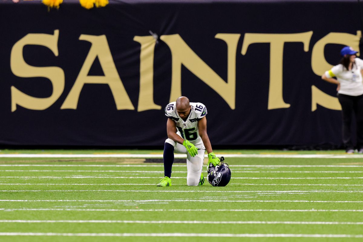 Seattle Seahawks wide receiver Tyler Lockett (16) takes a m moment to reflect on a time out against the New Orleans Saints during the second half at Caesars Superdome.