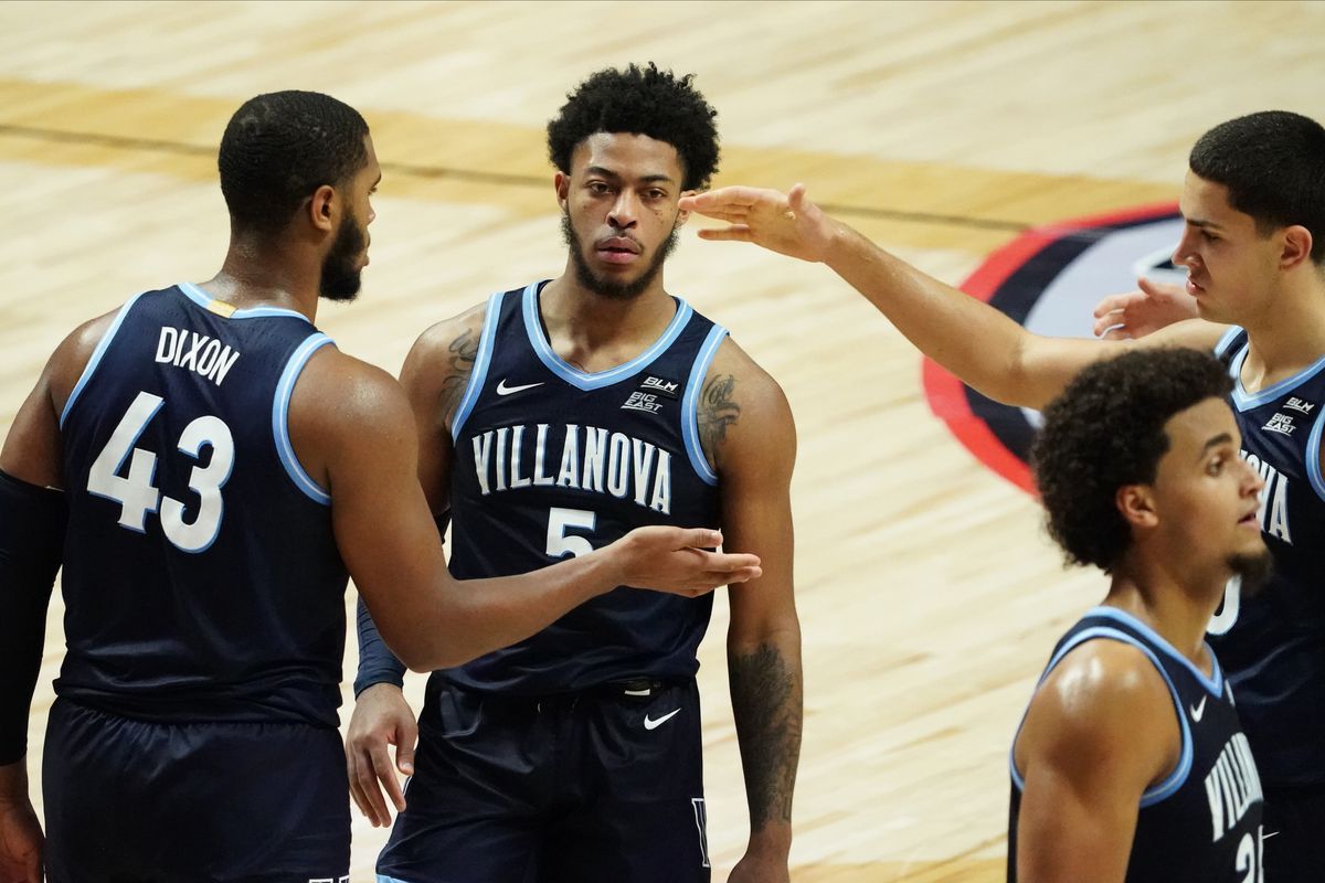 Villanova Wildcats forward Cole Swider, forward Eric Dixon and guard Justin Moore react after a play against the Hartford Hawks in the second half at Mohegan Sun Arena.&nbsp;