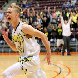 Diamond Ranch's Tyus Millhollin reacts to winning the 1A high school basketball state championship game against Rich at the Sevier Valley Center in Richfield Saturday, March 5, 2016. Diamond Ranch won 62-57.