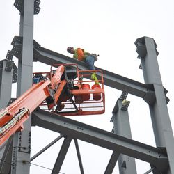 Steel workers at the top of the left field jumbotron structure - 