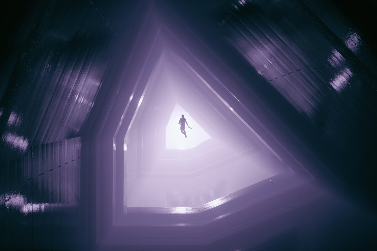 a woman floats down a purple hallway that’s shaped like a pentagon in Control