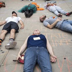 Students stage a die-in in front of Trump Tower to protest gun violence. | Ashlee Rezin/Sun-Times