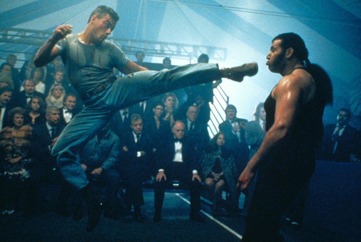 Jean-Claude Van Damme as Lyon performing a high kick in Lionheart.