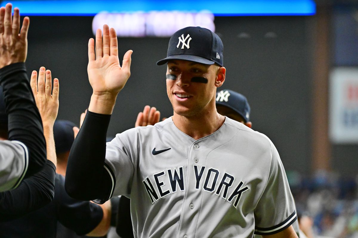 Aaron Judge #99 of the New York Yankees celebrates with teammates after defeating the Tampa Bay Rays 2-0 at Tropicana Field on May 27, 2022 in St Petersburg, Florida.