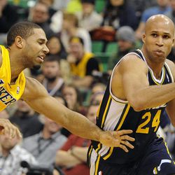 Utah Jazz small forward Richard Jefferson (24) drives to the basket past Los Angeles Lakers small forward Xavier Henry (7) during a game at EnergySolutions Arena on Friday, Dec. 27, 2013.