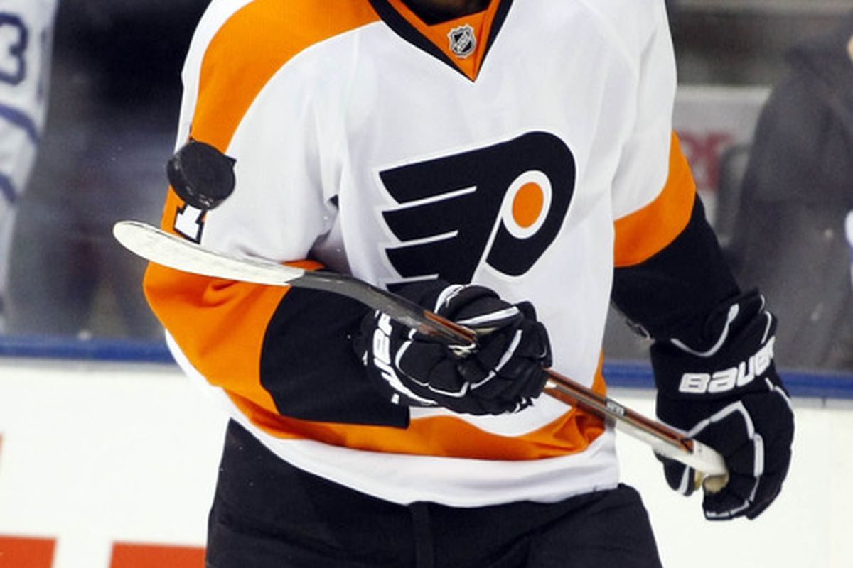 March 29, 2012; Toronto, ON, CANADA; Philadelphia Flyers forward Wayne Simmonds (17) juggles the puck before the game  against the Toronto Maple Leafs at the Air Canada Centre. Mandatory Credit: John E. Sokolowski-US PRESSWIRE