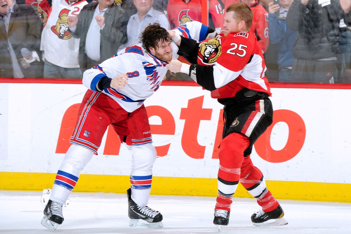 Chris Neil tried to do it all on Monday.  (Photo by Richard Wolowicz/Getty Images)