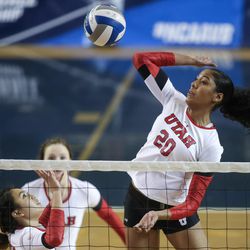 Utah setter Bailey Choy (8) sets up a shot for middle blocker Tawnee Luafalemana (20) in an NCAA first round match against UNLV at Smith Fieldhouse in Provo on Friday, Dec. 2, 2016.
