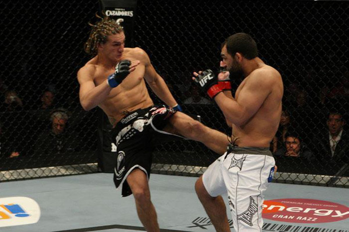 Ricardo Funch (left) kicks Johny Hendricks at UFC 107. (Photo via UFC.com)