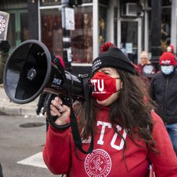 Chicago Teachers Union members and their supporters march and protest Monday in Pilsen after a news conference outside Joseph Jungman Elementary School.