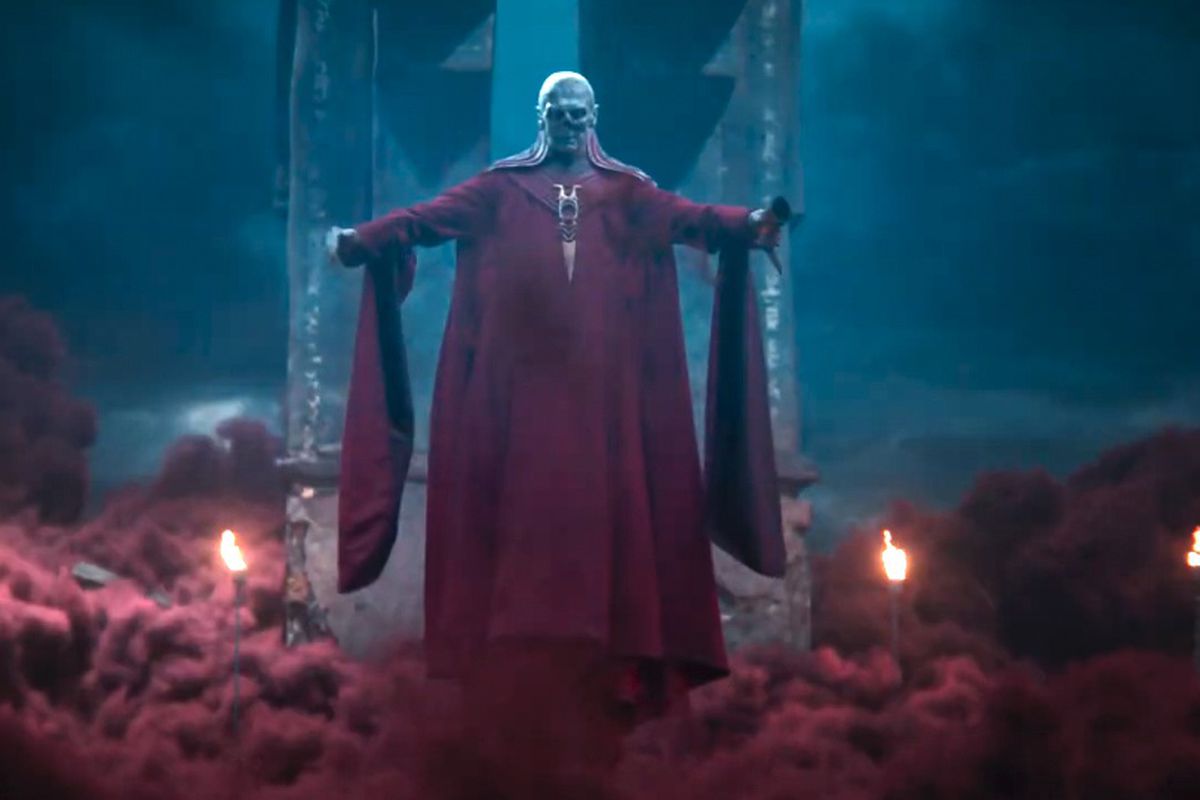 Szass Tam in the Dungeons &amp; Dragons movie floating in a red robe looking like a living skeleton surrounded by red mist