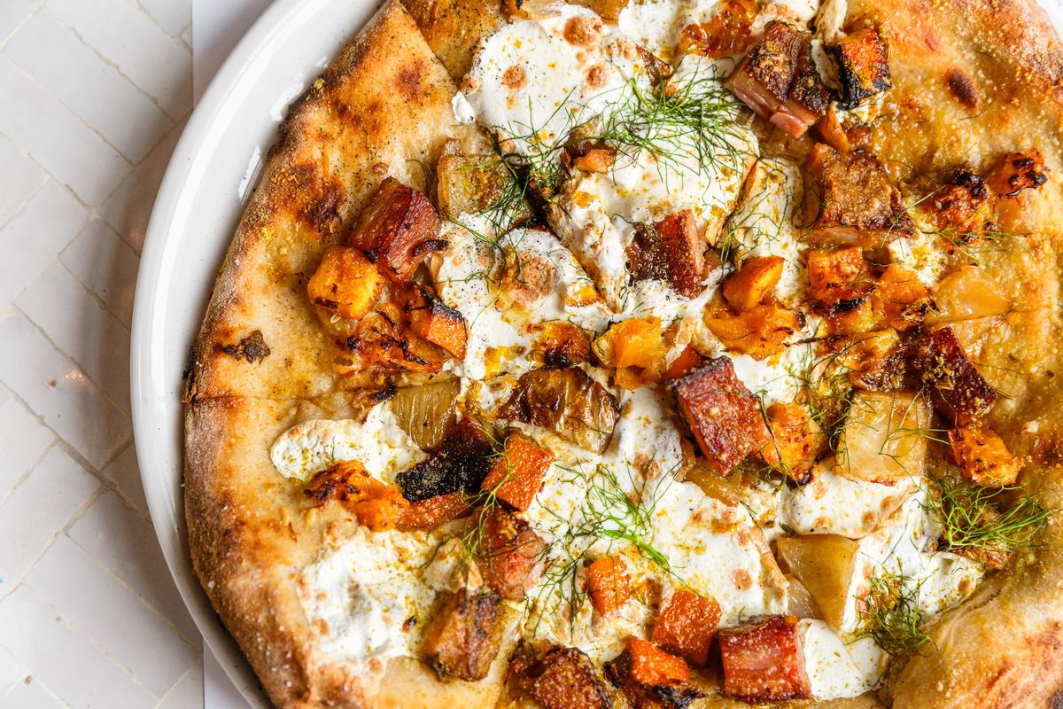 The guanciale pie with fennel, smoked mozzarella, and burnt orange