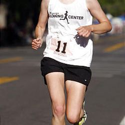 2009 winner Allie Scott pushes toward the finish of the marathon Saturday.
