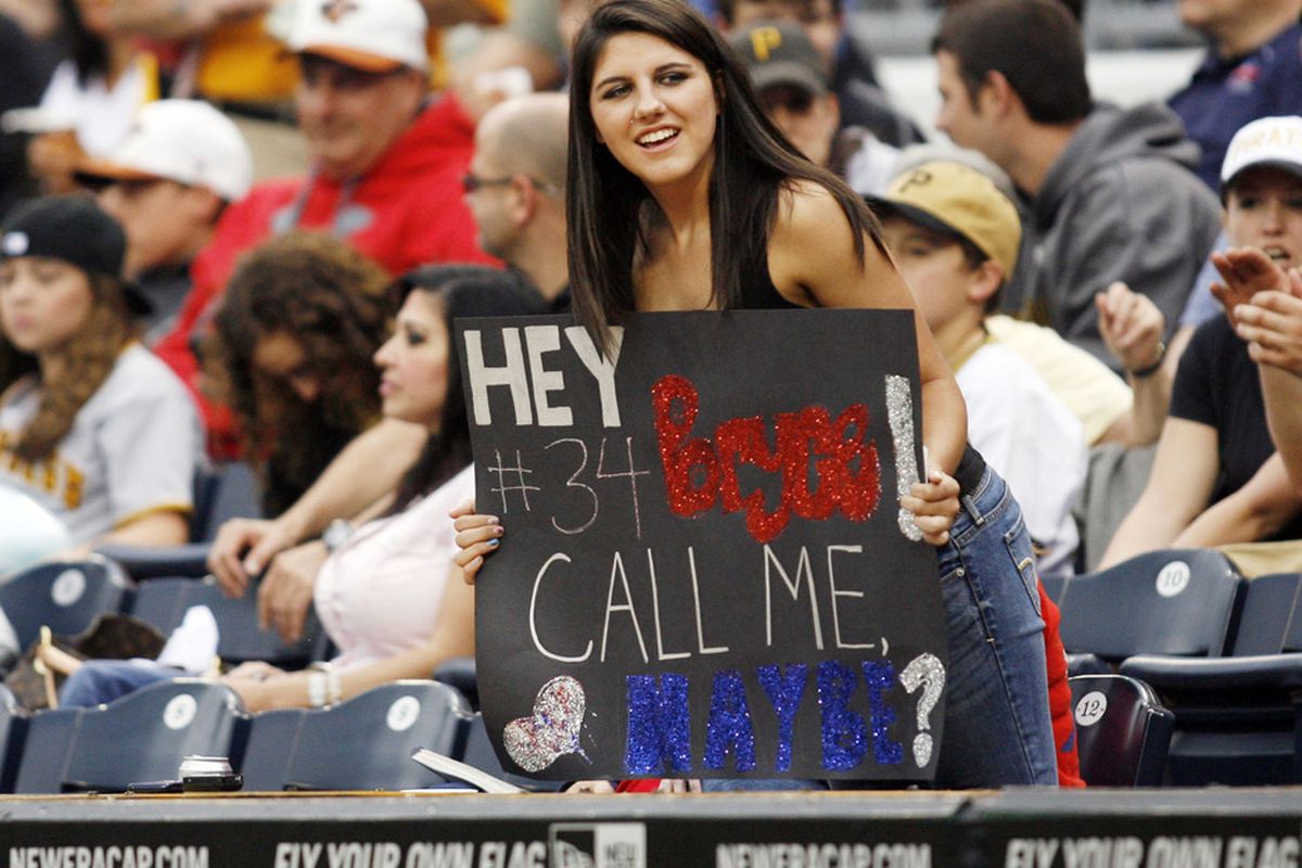 May 8, 2012; Pittsburgh, PA, USA; A fan holds up a sign for Washington Nationals right fielder Bryce Harper (34) before the game against the Pittsburgh Pirates at PNC Park. Mandatory Credit: Charles LeClaire-US PRESSWIRE