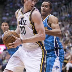 Utah's Gordon Hayward spins to the hoop around New Orleans' Brian Roberts as the Utah Jazz and the New Orleans Hornets play Friday, April 5, 2013 at EnergySolutions Arena in Salt Lake City. Utah won 95-83.